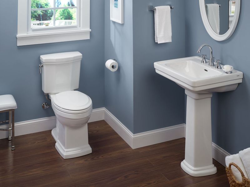 Promenade II Elongated 1.28 gpf Two-Piece Toilet in Cotton White