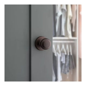 Cove Half Dummy Door Knob in Venetian Bronze