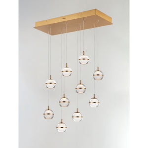 Swank 12.5' 10 Light Multi-Light Pendant Suspension Pendant in Natural Aged Brass