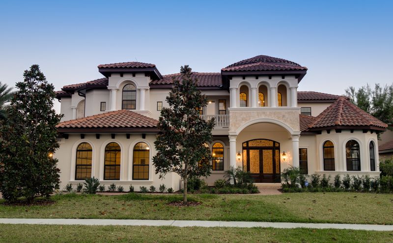 Carriage House DC 12.5' 3 Light Outdoor Wall Mount Light in Oriental Bronze with 7' Backplate