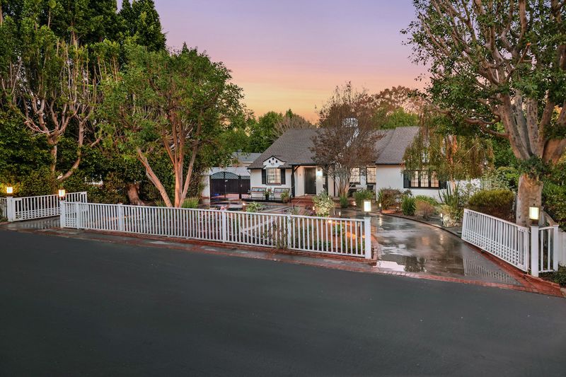 Terrace 5.25' Single Light Outdoor Wall Sconce in Bronze with Frosted Glass Finish