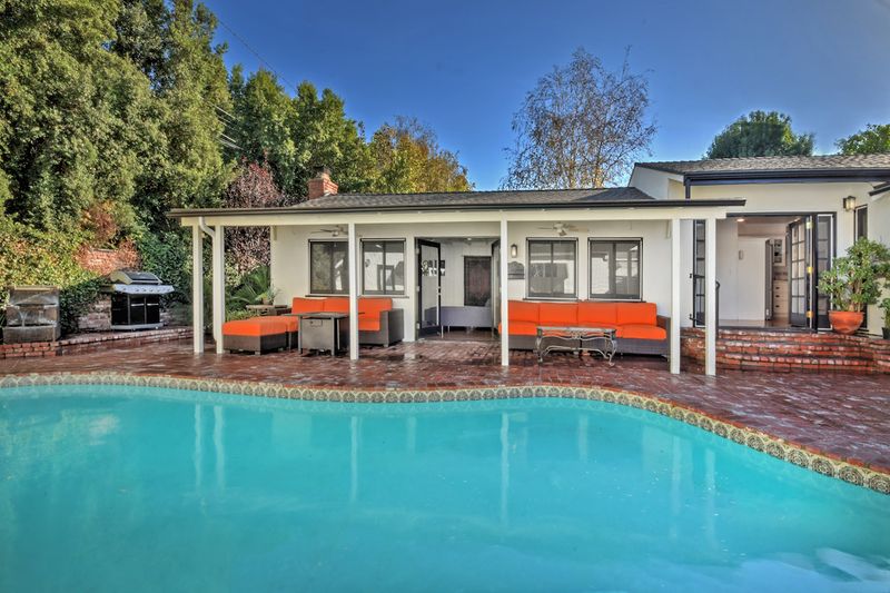 Terrace 5.25' Single Light Outdoor Wall Sconce in Bronze with Frosted Glass Finish