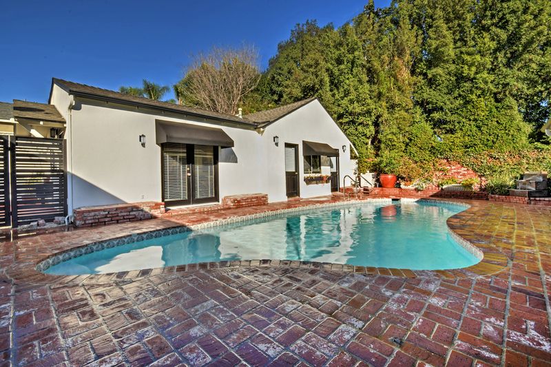 Terrace 5.25' Single Light Outdoor Wall Sconce in Bronze with Frosted Glass Finish