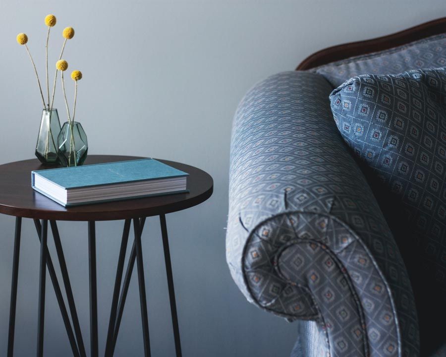 pastel couch with blue flowers