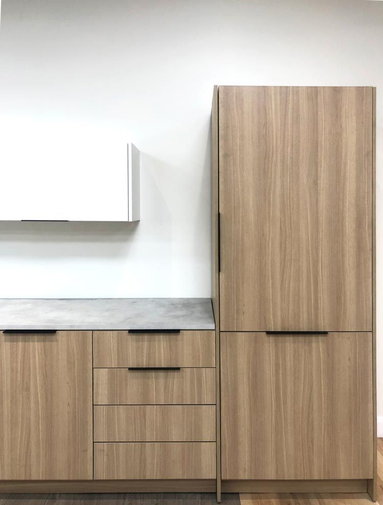 European style cabinets with wood-look melamine finish. 