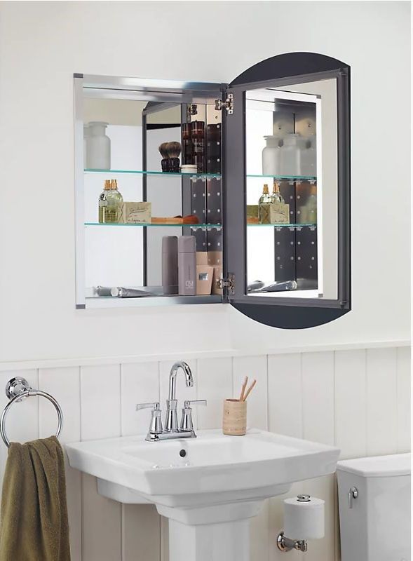 recessed medicine cabinet installed into a bathroom above a vanity