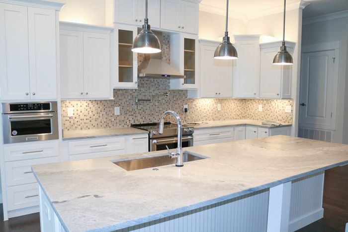 White partial overlay cabinets