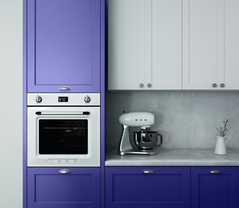 Two toned kitchen cabinets featuring white and very peri