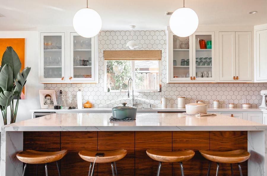 farmhouse kitchen with hexagonal tile backsplash