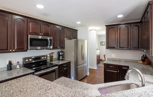 arched brown cabinet doors