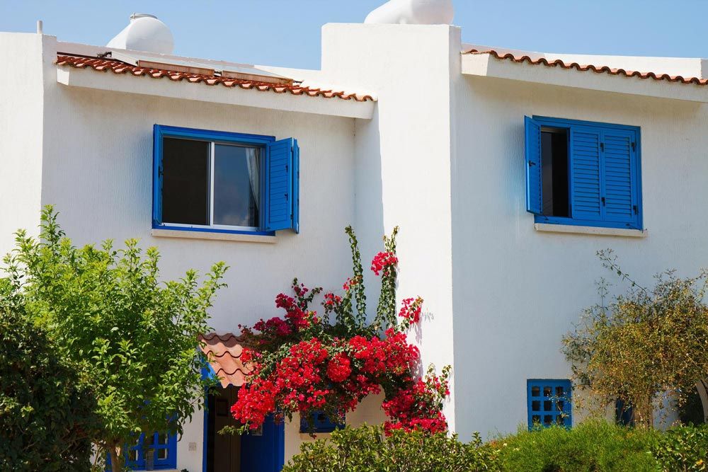 blue mediterranean style home
