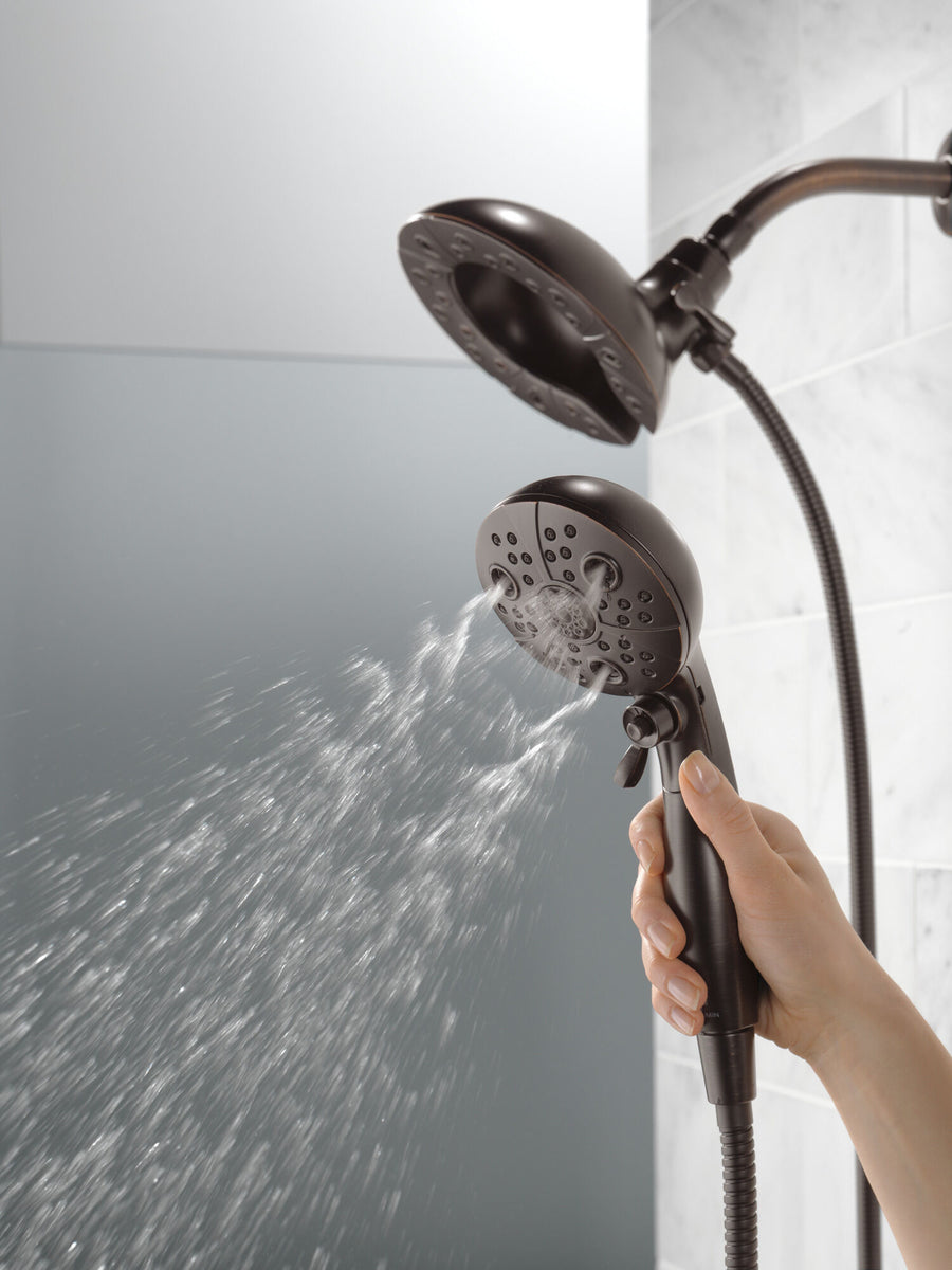 Universal Showering Components 6.88' Showerhead in Venetian Bronze - Pull Down Hand Shower
