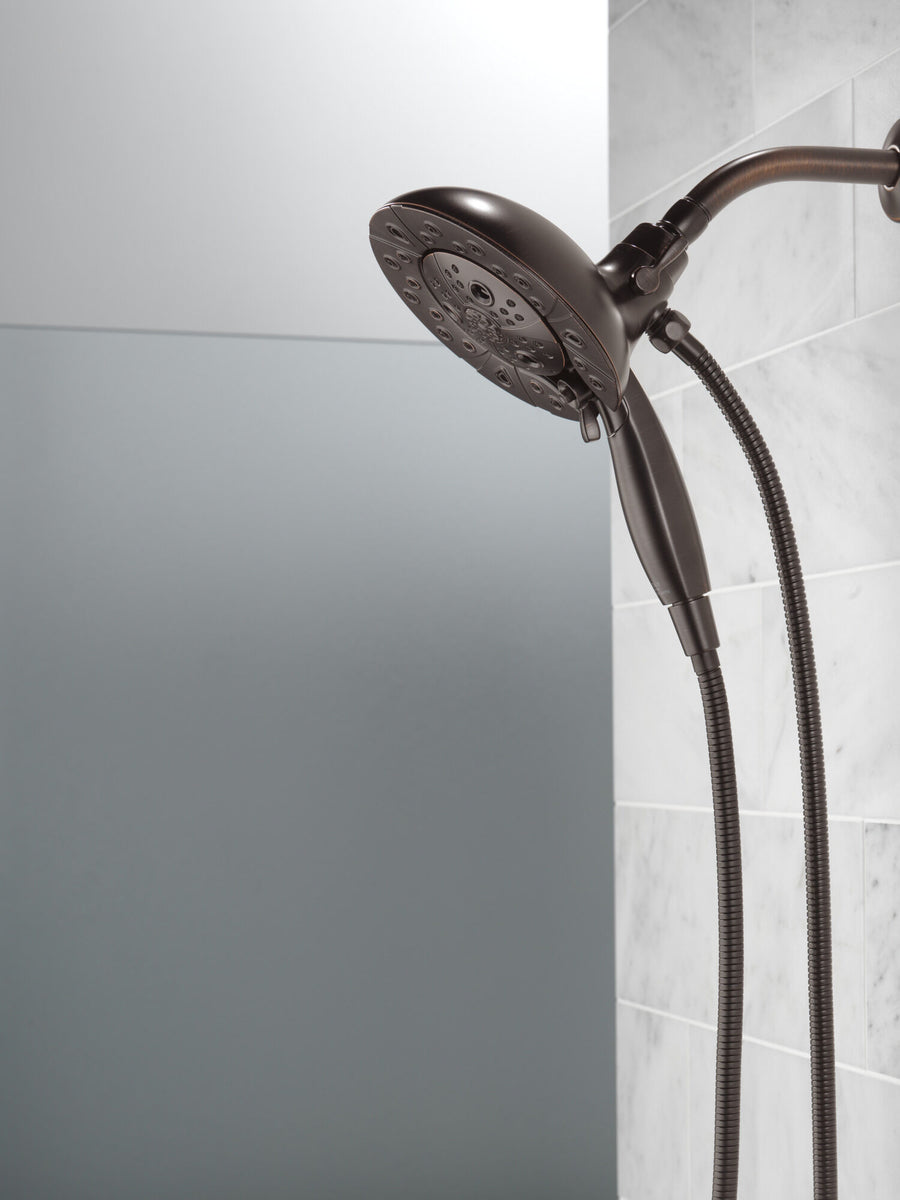 Universal Showering Components 6.88' Showerhead in Venetian Bronze - Pull Down Hand Shower