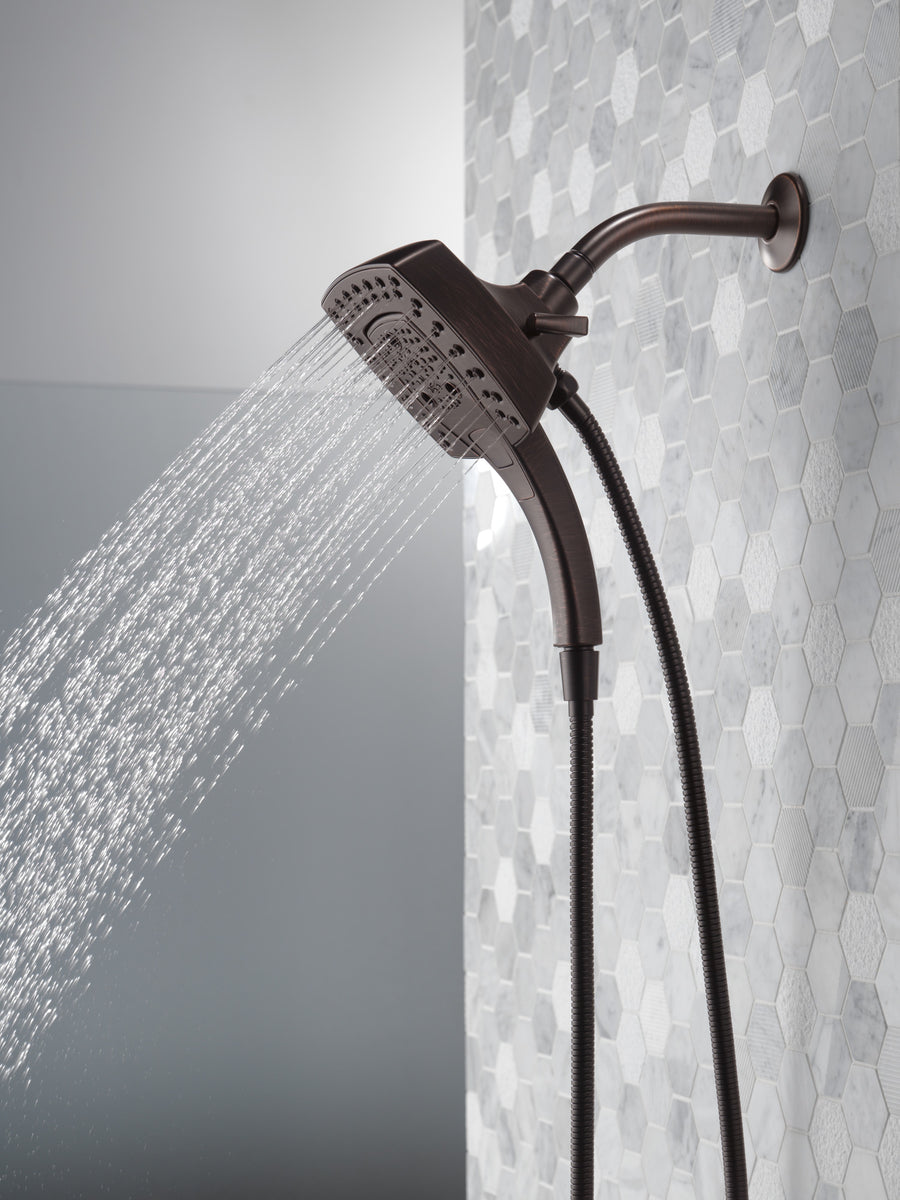 Universal Showering Components Two-In-One Showerhead in Venetian Bronze