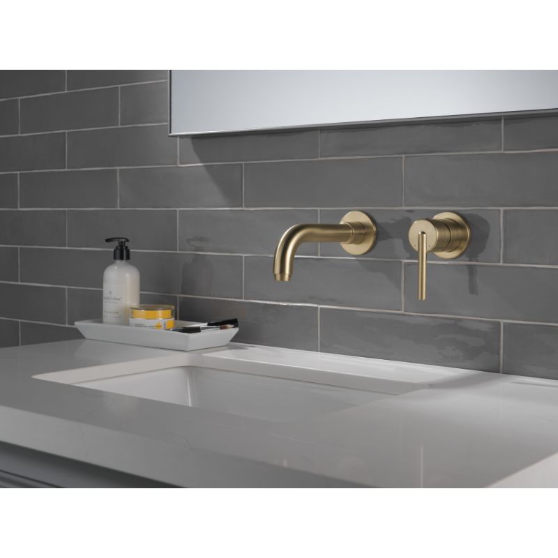 Trinsic Wall Mount Vanity Faucet in Champagne Bronze