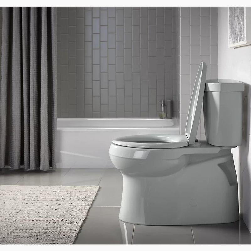 Cimarron Comfort Height Elongated 1.28 gpf Skirted Two-Piece Toilet in Biscuit