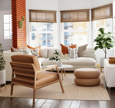 Neutral living room with brown and orange accents