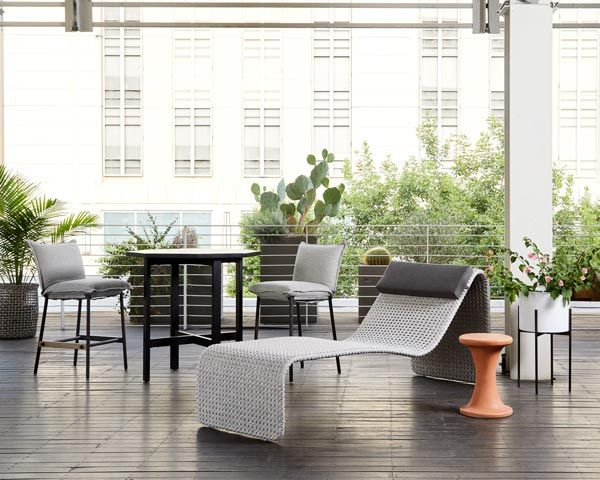 Outdoor furniture including a lounging char and steel patio table