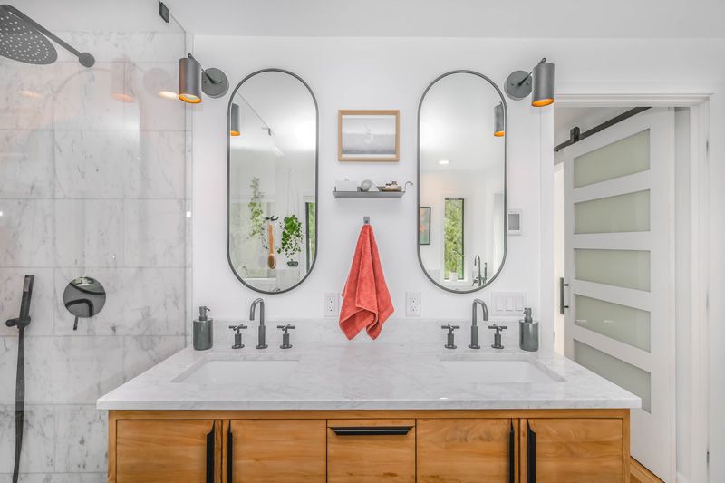 double sinks in white bathroom