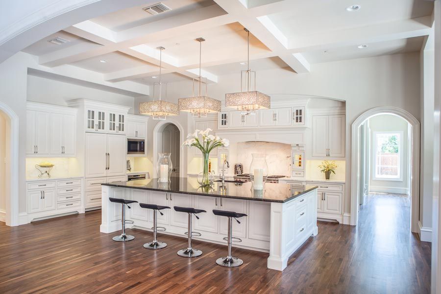 wood flooring in white modern farmhouse kitchen